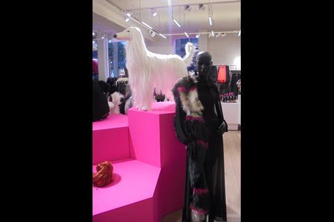 Life-size model dogs are used throughout the store
